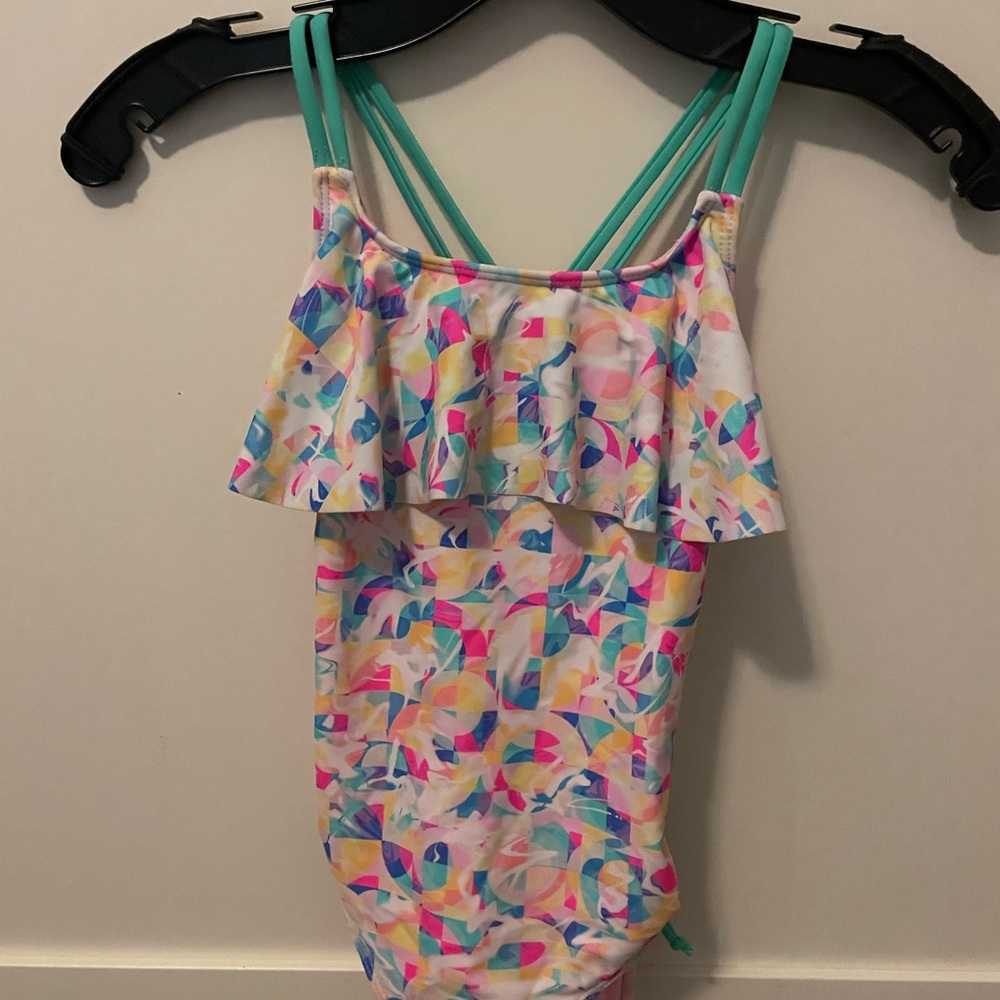 Girls One-Piece Ruffle Swimsuit in Pastel Geometric Print